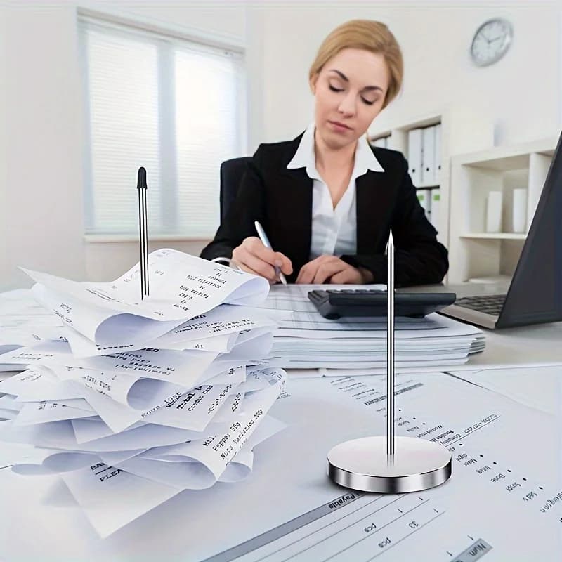Various Office Supplies Such As Paper Clips, Memo Holders, Receipt Holders, And Check Holders Are Available For Use In The Offic