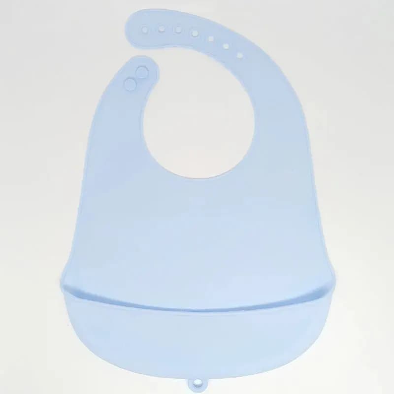 The baby feeding bib is made of silicone and has a water-resistant design. It is suitable for feeding purposes.