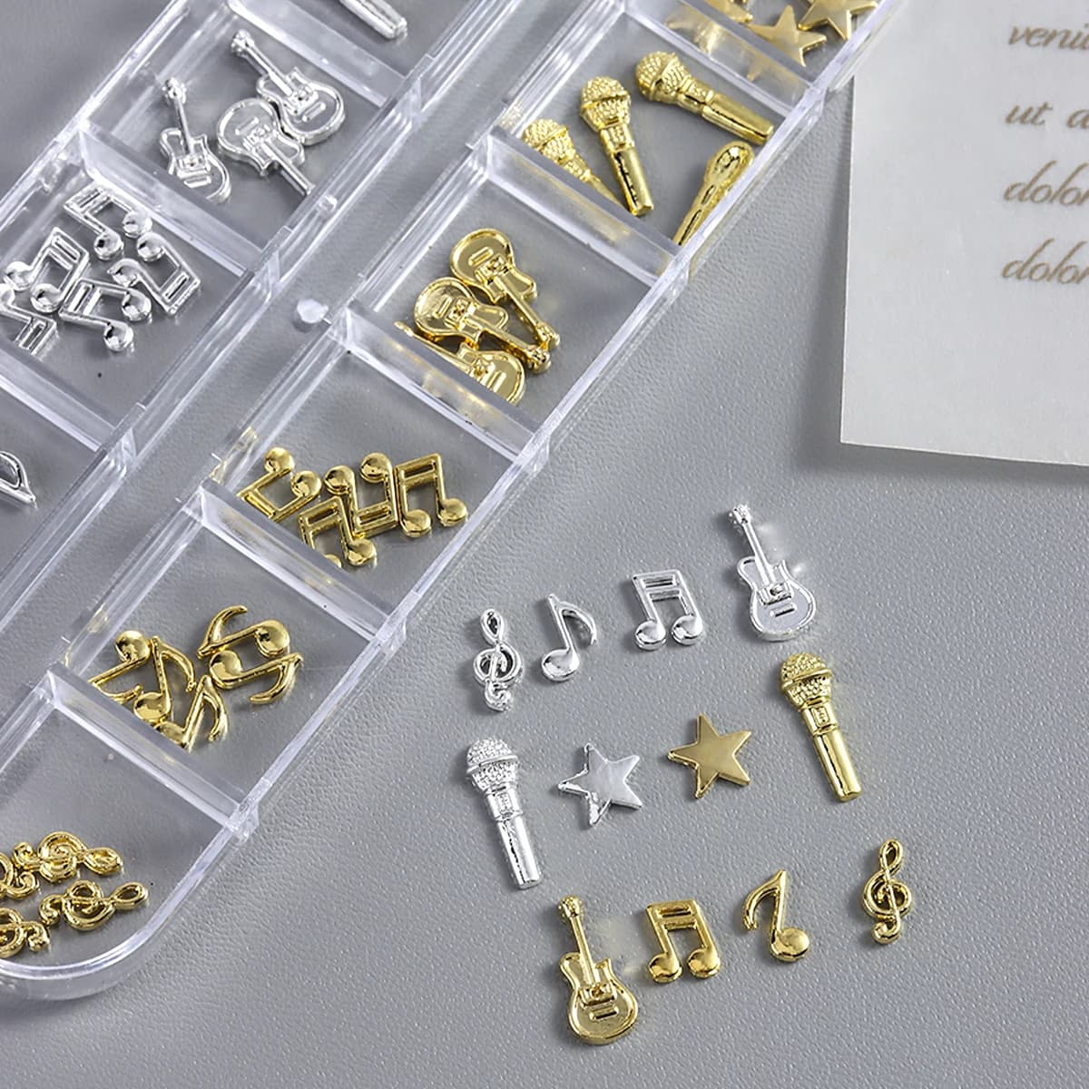 Nail art musical symbol alloy ornaments, a mix of 3D metal accessories, retro punk hollowed-out musical note nail art ornaments.