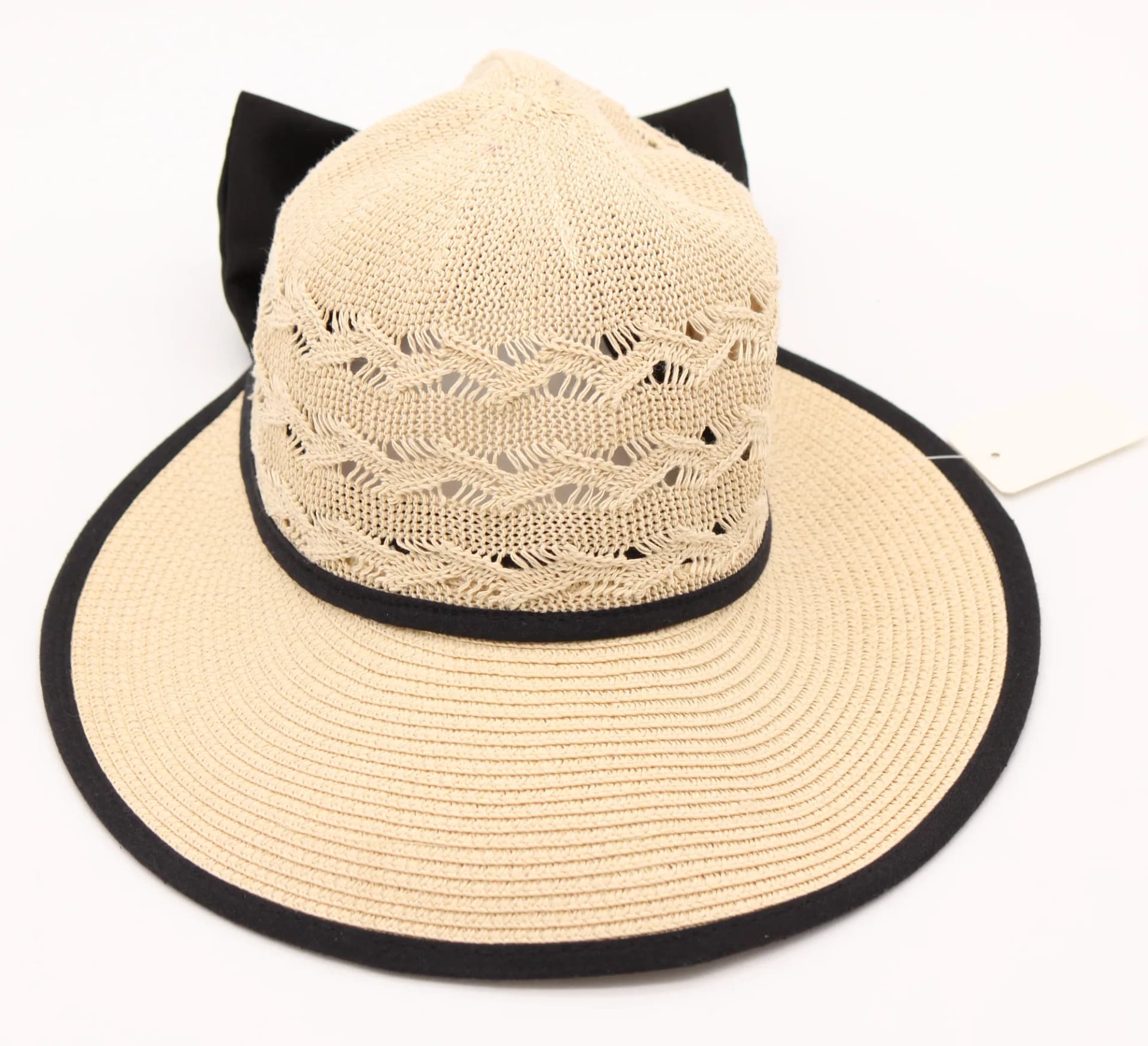 Wide-brimmed straw hat with a knitted design and black bow